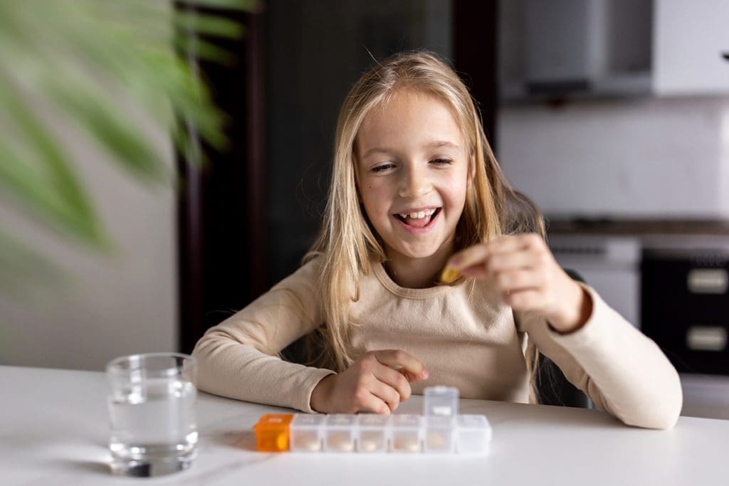 child taking medication