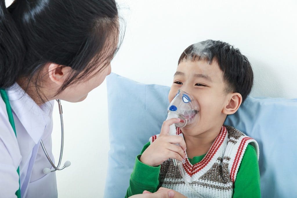 doctor with child with asthma